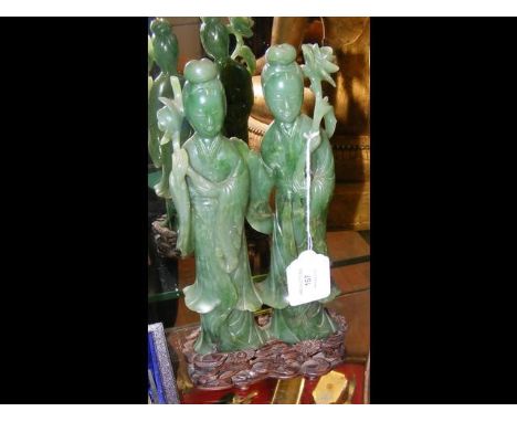 Carved jade figures on wooden stand - 26cm high CONDITION REPORTSee further images; possibly missing a flower to top of figur