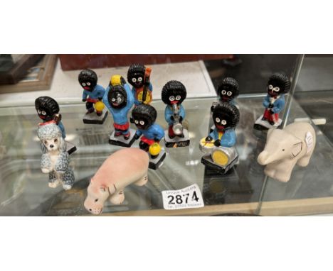 9 vintage Robertson Gollys band & football players etc. Notice from the the-saleroom.com: These items are listed on the basis
