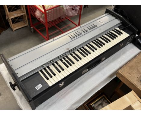 A vintage Hohner electric piano with sustain pedal (untested)Has a power lead.No legs but hand nuts attached on sides.A lid w