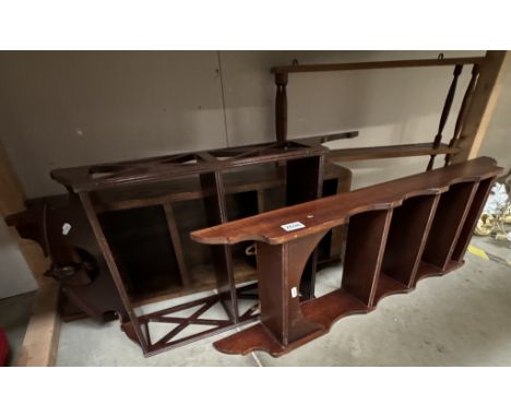 A quantity of dark wood shelf units