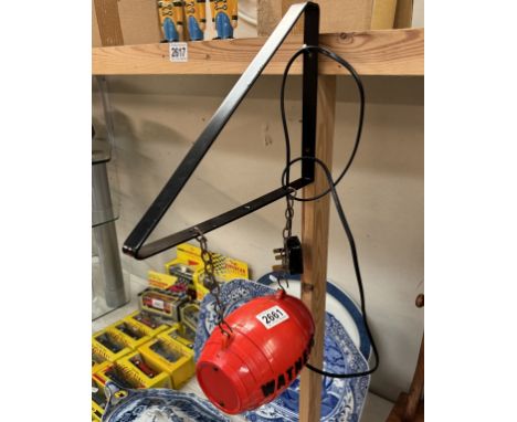 A Watneys red barrel hanging pub light