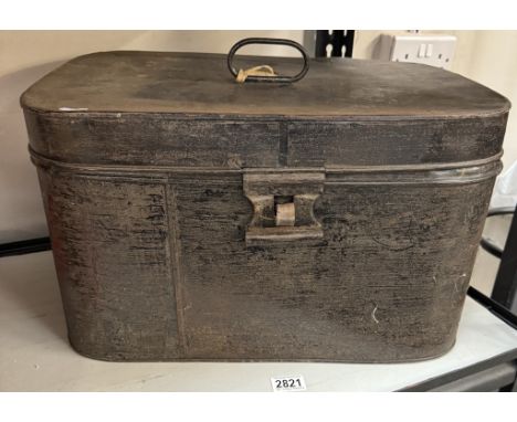 A large vintage metal trunk carry case