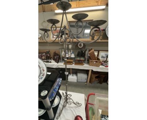 A wrought iron pricket multi candlestick