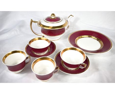 A Rockingham pink and gilt 8 piece part tea set, saucers with griffin mark, comprising of a teapot, 2 teacups, 2 coffee cups,