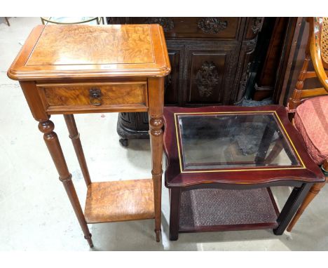 A reproduction two tier plant stand with single drawer above