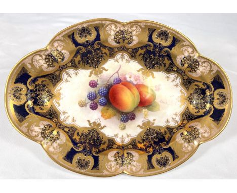 Royal Worcester: an oval porcelain fruit dish decorated with peaches and blackberries, signed A SHUCK, 27.5cmCondition report