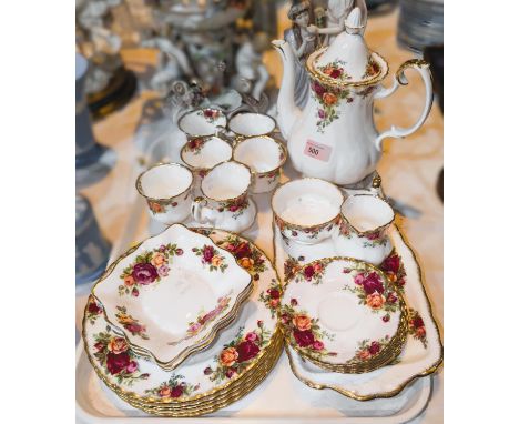 A Royal Albert Old Country Roses part coffee service, including coffee pot etc. and a lamp.