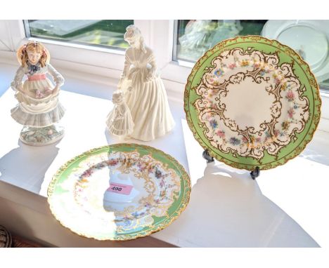 A pair of green Royal Crown Derby bordered cabinet plates, a Royal Worcester figure, 'Mother Sunday' and a Coalport figure, '