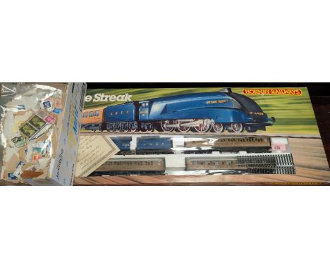 Hornby 'The Blue Streak' boxed train set; a selection of loose stamps.