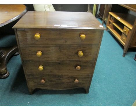 A VICTORIAN MAHOGANY COMMODE in the form of a chest the rectangular top with two mock drawers opening to reveal a chamber pot