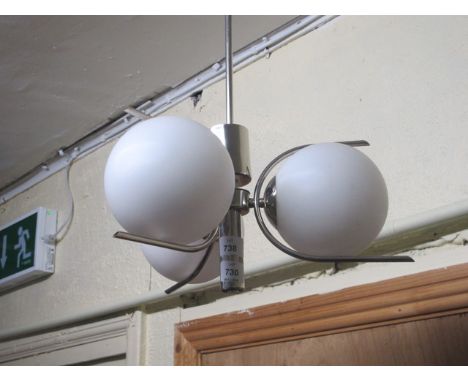 A FRENCH CHROME THREE ARM CEILING LIGHT with three opaque spherical shades