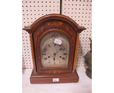 A MAHOGANY AND SATINWOOD INLAID BRACKET CLOCK the rectangular arched hood above a silver dialed with Roman numerals between c