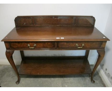 A MAHOGANY WALNUT SIDE TABLE the rectangular top with moulded gallery above two frieze drawers and open shelf on cabriole leg