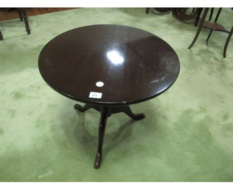 A MAHOGANY WINE TABLE the circular moulded top above a baluster column on tripod support 52cm (h) x 58cm (d)
