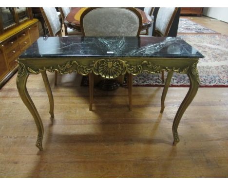 A CONTINENTAL GILTWOOD CONSOLE TABLE surmounted with green vein marble top above a carved frieze on cabriole legs 110cm x 42c