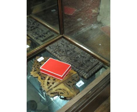 A TELESCOPIC BOOKEND with hinged ends together with a pierced fruitwood wall bracket
