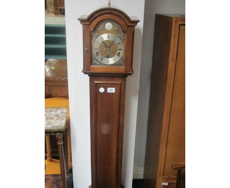 A MAHOGANY CASED GRANDMOTHER CLOCK the rectangular arched hood above a glazed door containing a circular silver and brass dia