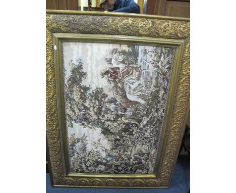 A NEEDLEWORK PANEL depicting hunting scene in a wooded landscape with foliate flowerhead and moulded frame 140cm x 130cm