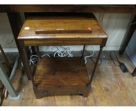 A GEORGIAN MAHOGANY OCCASIONAL TABLE the rectangular moulded top above an open shelf with frieze drawer joined by cylindrical