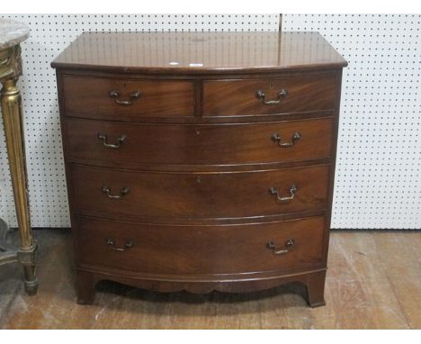 A FINE GEORGIAN MAHOGANY CHEST of demilune outline the shaped moulded top above two short and three long graduated drawers wi