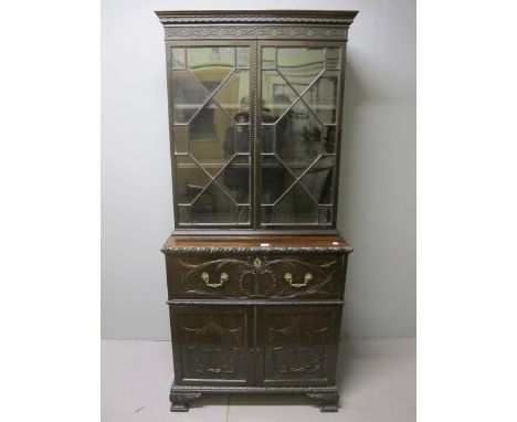 A FINE HEPPLEWHITE STYLE MAHOGANY SECRETAIRE BOOKCASE 19th Century the dentil moulded cornice above a pair of astragal glazed