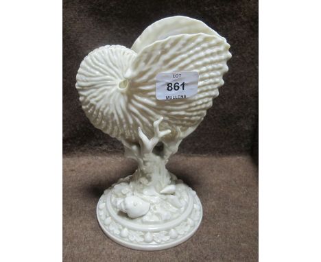 A ROYAL WORCESTER FIGURE in the form of a conch shell on a circular foot 22cm high