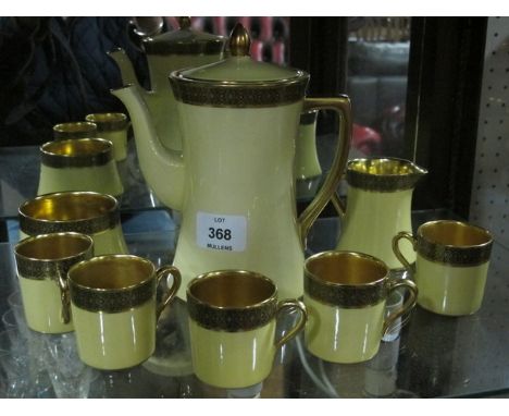 AN EIGHT PIECE CARLTON WARE COFFEE SET comprising five coffee cans, coffee pot, cream jug and sugar bowl