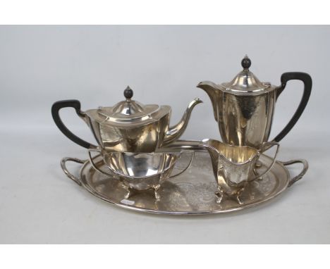 A silver plate tea service with tray.