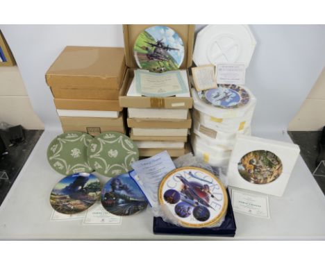 A quantity of collector plates, predominantly boxed from the Trains Of The Orient Express series and aeroplane related exampl