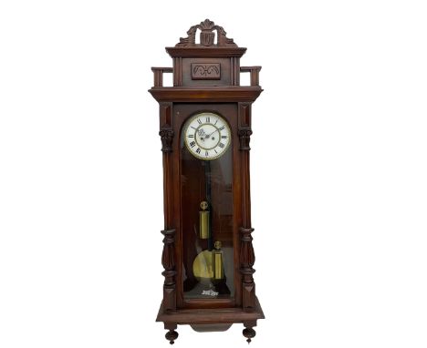 Weight driven German 'Vienna style' wall clock c1890, with a rectangular pediment with a carved crown and supports, fully gla