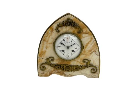 A 20th century French art-deco mantle clock in an amber-veined marble lancet shaped case with applied brass mounts, circular 