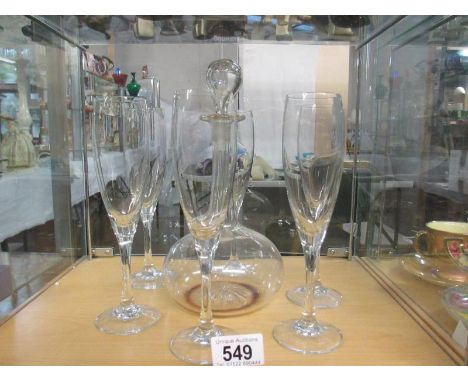 A decanter and six glasses
