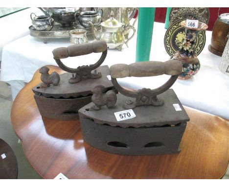 Two vintage coal irons