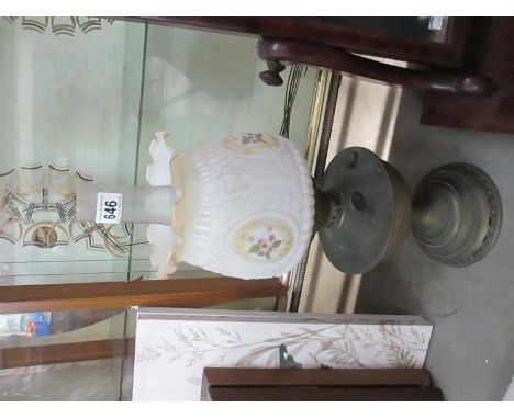 An old oil lamp connected to electric