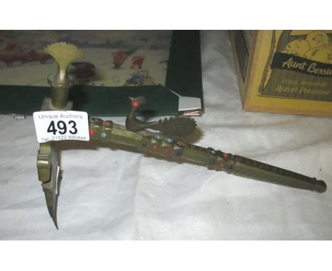 A jewel encrusted axe hammer