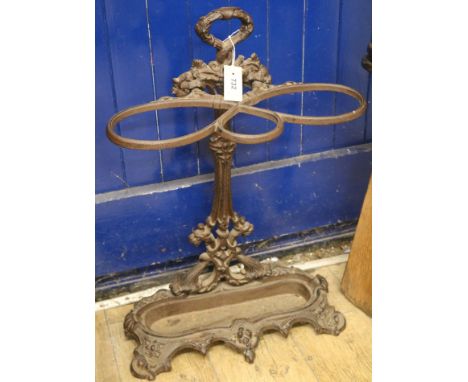 A cast iron stick/umbrella stand, H.72cm