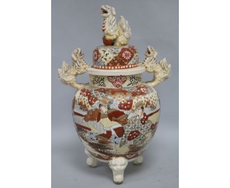 A Japanese Satsuma koro, the domed cover with shishi finial, decorated with figures, H.15.25in (38.75cm)