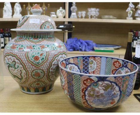 A Chinese lidded ceramic vase and a Japanese Imari ceramic bowl