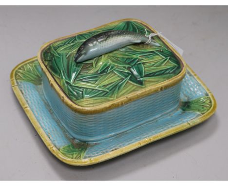 A George Jones majolica sardine dish, cover and integral stand