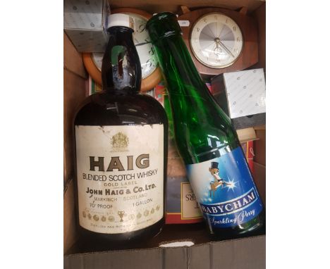 A mixed collection of items to include oversized Babysham bottle, vintage Haig Scotch whisky 1 gallon bottle, mid century man