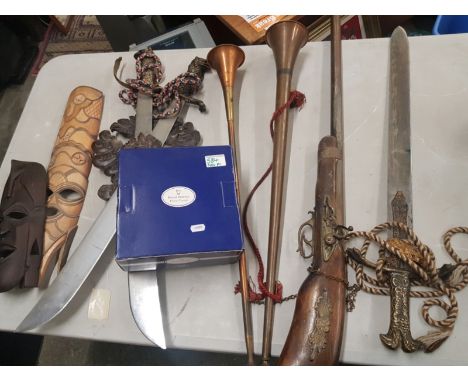 A mixed collection of items to include African carved wooden wall mask, wall hanging swords, wall hanging musket &amp; two co