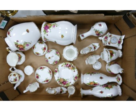 Royal Albert Old Country Rose Patterned items to include Vases, ginger jar, ornaments, miniatures, mantle clock etc 