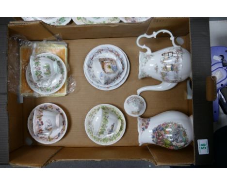 A collection of Royal Doulton Seconds Brambly Hedge cups &amp; saucers, coffee pot &amp; vase 