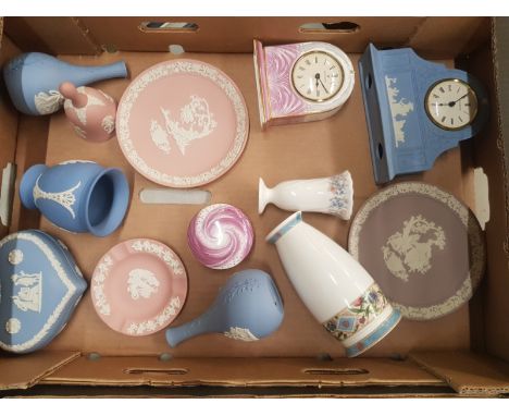 A good collection of Wedgwood jasperware to include a Blue jasperware mantle clock, mouve plate, pink plate and ash tray, tog