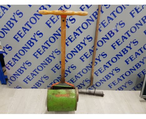 VINTAGE FOLBATE MANUAL LAWNMOWER TOGETHER WITH A RAKE