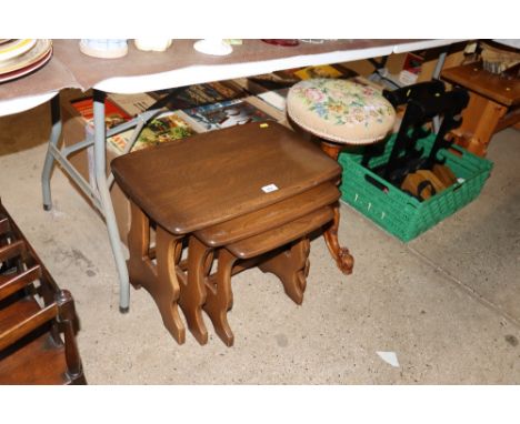 A nest of three Ercol occasional tables