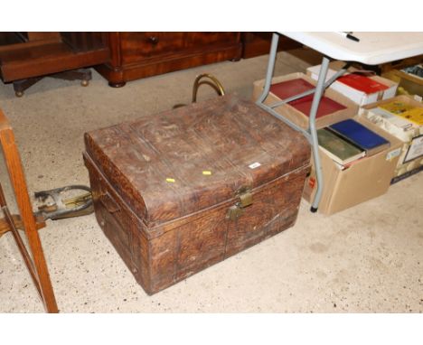 A japanned tin trunk and contents of bed pan, stoneware hot water bottles and a shaving mug