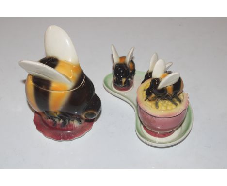 A Goebel preserve pot in the form of a bee; and a Goebel cruet set in the form of bees