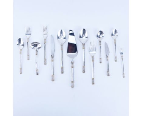 Ninety-Four (94) Piece Wallace Golden Aegean Weave Sterling Silver Flatware Set. Set includes: 12 forks 8", 12 knives 9-1/4",