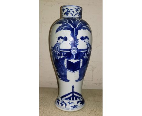 A Chinese porcelain inverted baluster vase decorated in underglaze blue with a genre scene, 26 cm 